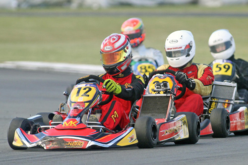 Chris Cox (#12) from Rangiora will contest three different classes at the meeting - 125cc Rotax Max Light, Open and KZ2