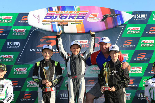 On the podium at the Race of Stars kart meeting in Queensland on Saturday were young Kiwi Connor Davison from Hamilton (left), KA 12 class winner Jay Hansen (middle with surfboard) and third placed Oscar Comley