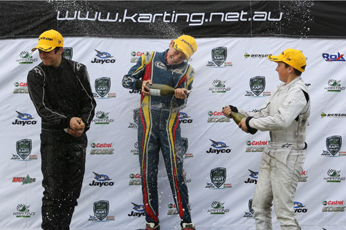 Jack Doohan (middle) enjoying the spoils of victory at Round 2 of the 2015 Australian Kart Championship 
