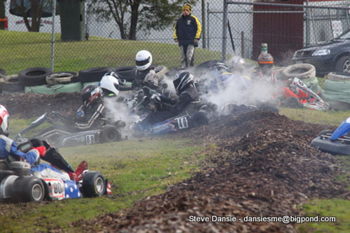 Another shot of the lap 2 wipeout that claimed 9 of the 15 starters in the Junior National Medium final