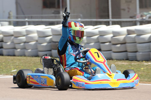 Jesse Elliott crossing the line for victory in Rotax Light