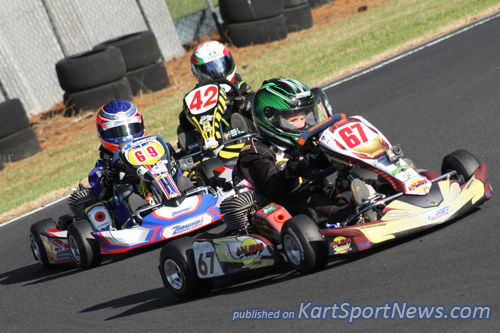 Brock Fewins (#67) leads Leo Iannella (#69) and Annalise Ellis (#42) during a heat race at Rd 2 of the SA Kart Championships